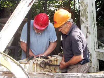Alain Beaupain and Jim Pointer working on the fantail carriage